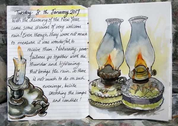 Paraffin lamps and a candlestick